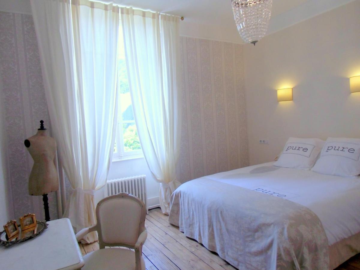 Hôtel De La Providence Egliseneuve-d'Entraigues Quarto foto